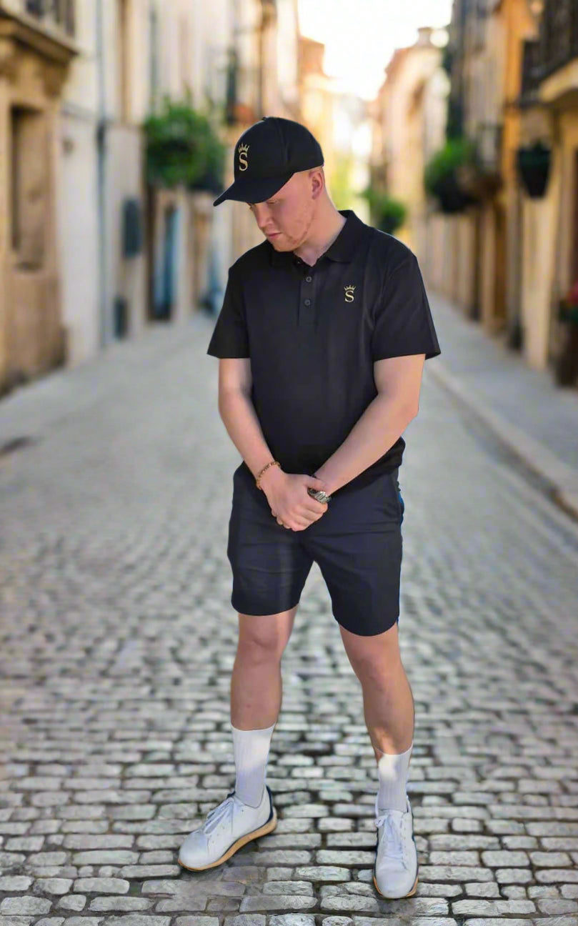 Lee is wearing a medium polo and Sobriety cap